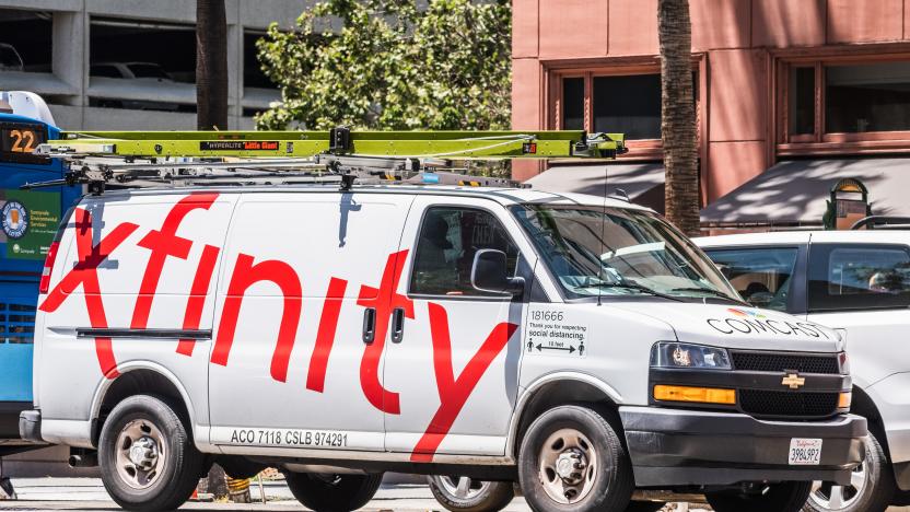 May 20, 2020 San Jose / CA / USA - Side view of Comcast Cable / Xfinity service van driving on the street. Comcast is the largest home internet service provider in the United States.