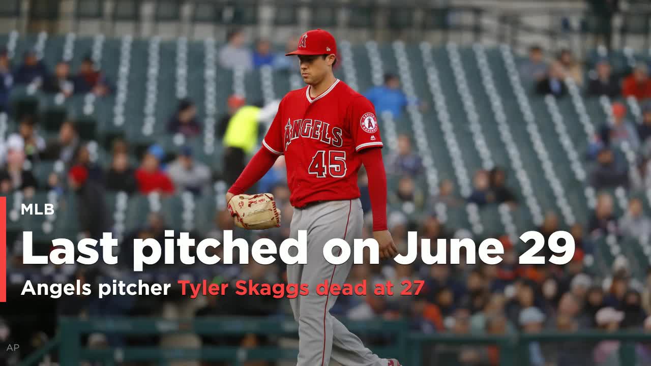 Los Angeles Angels bring Tyler Skaggs' jersey onto the field and