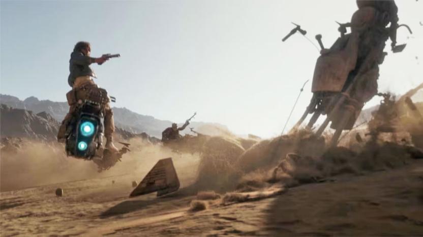 A still from the video game Star Wars Outlaws showing two flying motorcycle-like vehicles. One rider is shooting the other one and results in the second vehicle crashing into the sand.