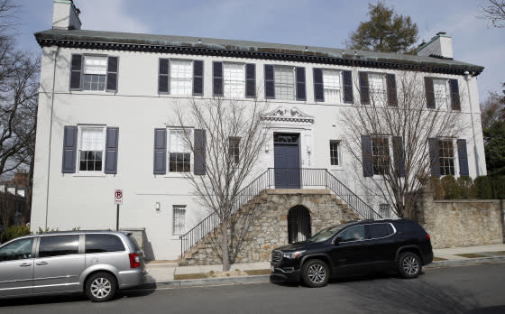 Vehicles are parked outside the home of Ivanka Trump and Jared Kushner, in Washington.