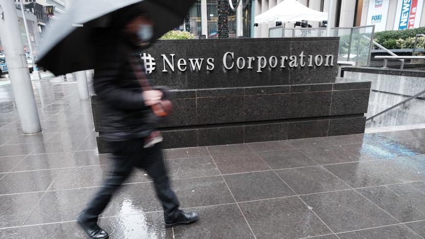 NEW YORK, NEW YORK - FEBRUARY 04:  People walk past 1211 Avenue of the Americas the headquarters for News Corp on February 04, 2022 in New York City. The global media company and owner of Fox News and The New York Post announced that in January it suffered a cyberattack which it believes China was behind. The company said that hackers targeted an IT provider which resulted in the theft of unspecified data. (Photo by Spencer Platt/Getty Images)