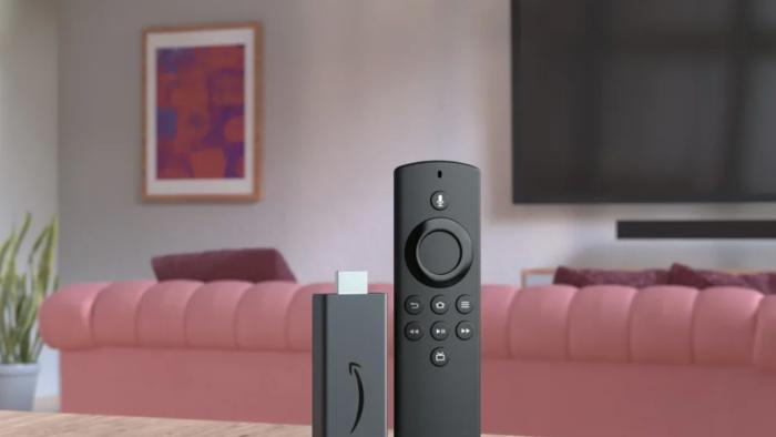 An image of a Fire TV Stick on a table. 