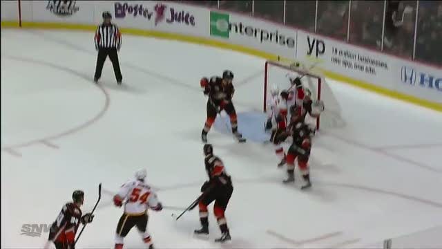 David Jones squeezes puck into tight window