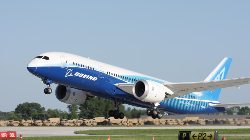 "Oshkosh, WI, USA - July 29, 2011:  Brand new Boeing 787 Dreamliner in factory paint scheme taking off during EAA Airventure 2011."