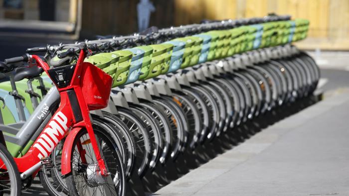 PARIS, FRANCE - MAY 14: An Uber Jump bike and Velib Metropole self-service public bikes are parked at a distribution point during the Coronavirus (COVID-19) pandemic on May 14, 2020 in Paris, France. Paris mayor Anne Hidalgo has launched a policy to promote the circulation of bikes in Paris. France is slowly reopening after almost two months of strict lockdown throughout the country due to the epidemic of coronavirus (COVID 19) on May 14, 2020 in Paris, France. The Coronavirus (COVID-19) pandemic has spread to many countries across the world, claiming over 300,000 lives and infecting over 4.4 million people. (Photo by Chesnot/Getty Images)