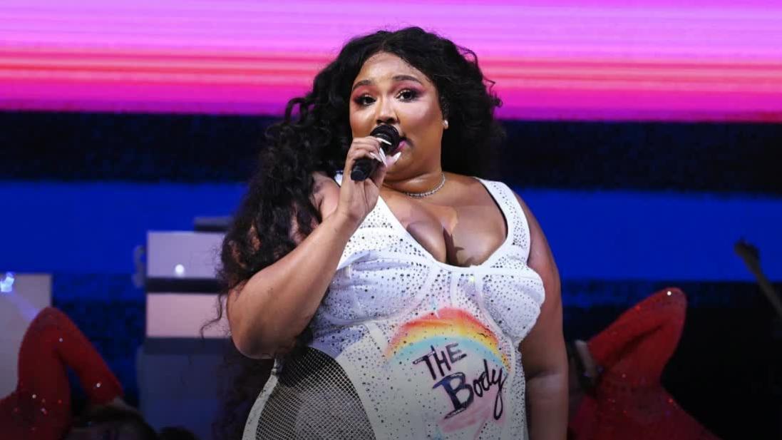 Lizzo struts in bum-baring leggings from new shapewear line and fans are in  love