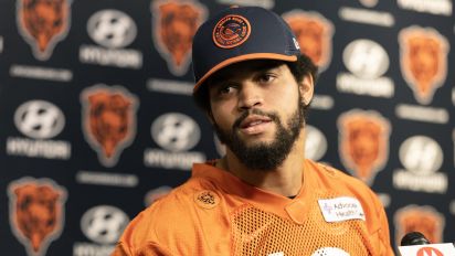 Getty Images - Chicago Bears quarterback Caleb Williams speaks with the media before the start of rookie minicamp at Halas Hall on May 10, 2024, in Lake Forest, Illinois. (Stacey Wescott/Chicago Tribune/Tribune News Service via Getty Images)