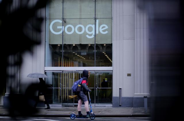 NEW YORK, NEW YORK - JANUARY 25: A woman skates near Google offices on January 25, 2023 in New York City. The U.S. Justice Department and a group of eight states sued Google accusing it of illegally abusing a monopoly over the technology that powers online advertising. (Photo by Leonardo Munoz/VIEWpress)