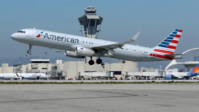 American Airlines rises after boosting Q2 profit forecasts