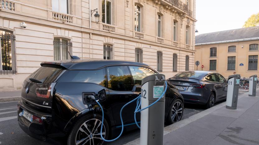 Paris, France - Aug 30, 2019: BMW i3, and a Tesla electric cars charching in Paris, France.