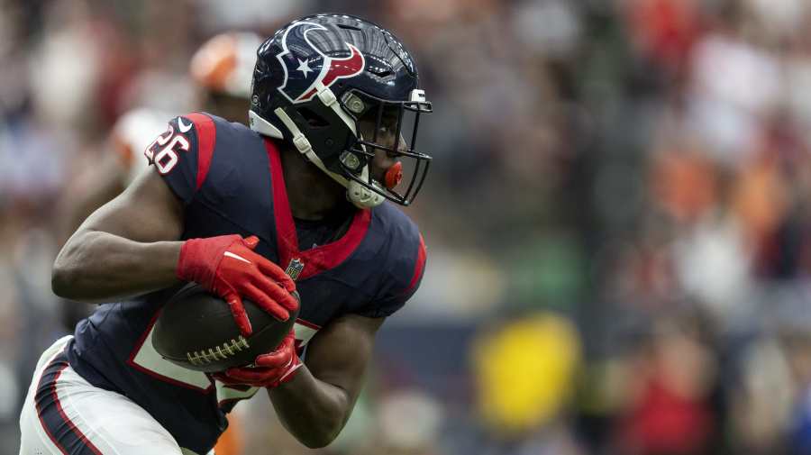 Getty Images - HOUSTON, TEXAS - JANUARY 13: Devin Singletary #26 of the Houston Texans runs with the ball during an NFL wild-card playoff football game between the Houston Texans and the Cleveland Browns at NRG Stadium on January 13, 2024 in Houston, Texas. (Photo by Michael Owens/Getty Images)