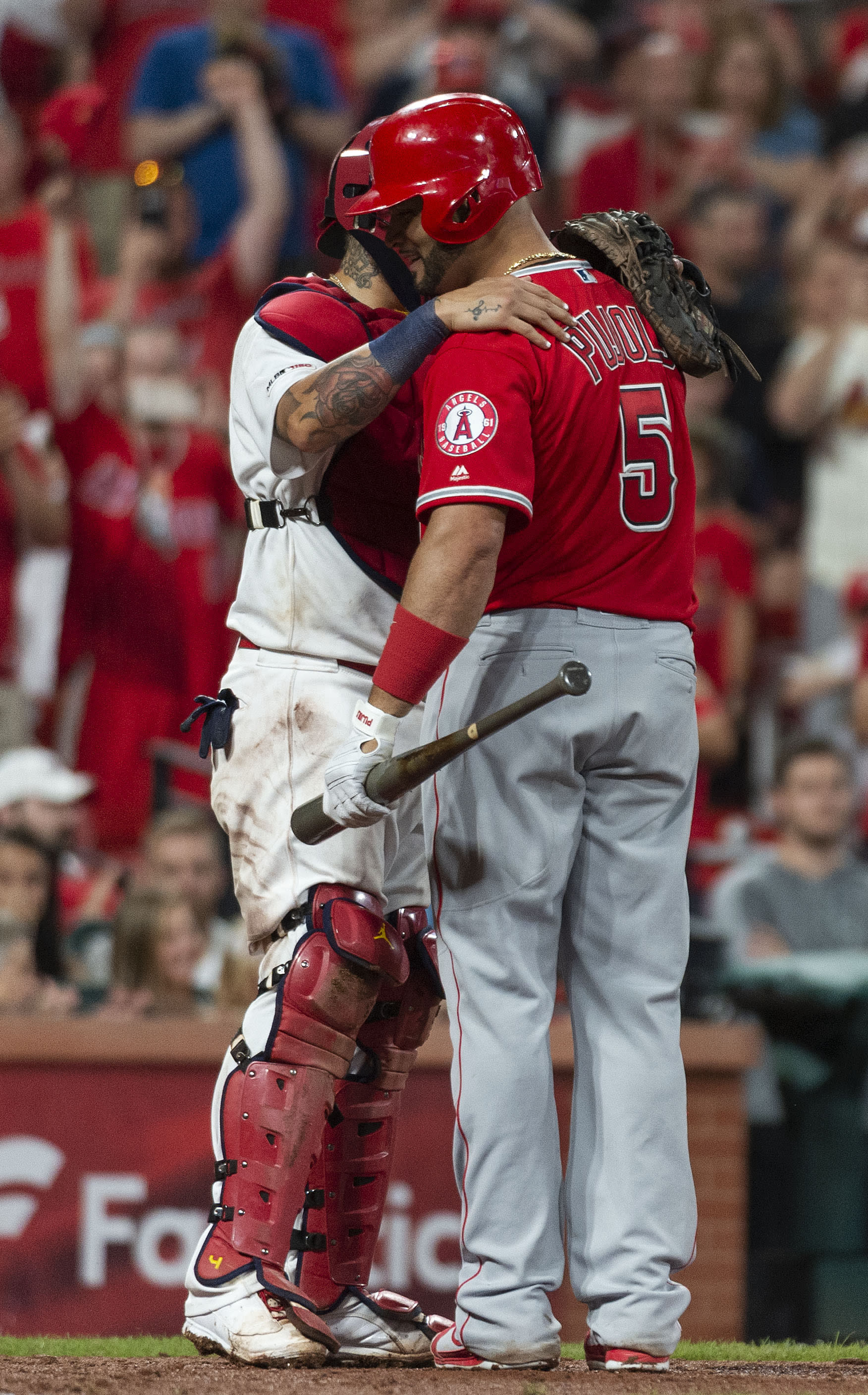 Pujols concludes STL return with 2 hits, Molina jersey swap