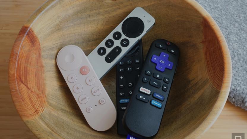 Remotes for the best streaming devices are in a wooden bowl. 