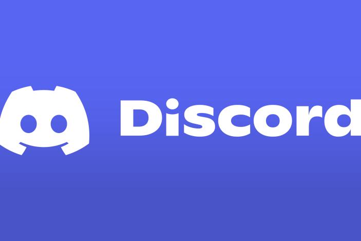 Discord logo in white over a bluish-purple-colored background.