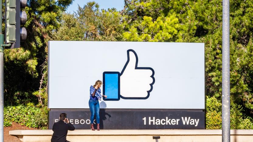 Feb 16, 2020 Menlo Park / CA / USA - Girl posing in front of the Facebook Like Button sign, located at the entrance to the company's main headquarters, Silicon Valley