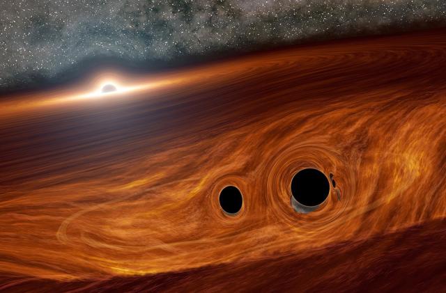 Artist's depiction of orbiting black holes near a supermassive black hole