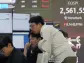 Stock market today: Asian shares are mixed after Middle East tensions weigh on Wall St