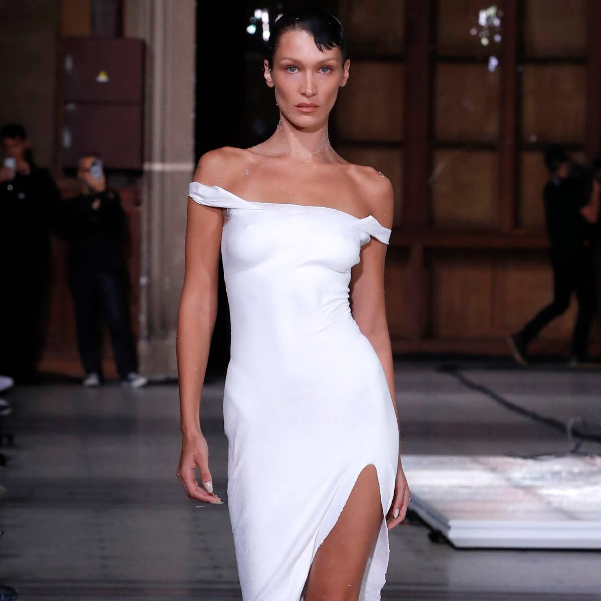 Bella Hadid Gets a Dress Sprayed on Her Nude Body for a Total Fashion ...