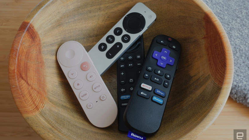 Remotes for the best streaming devices are in a wooden bowl. 