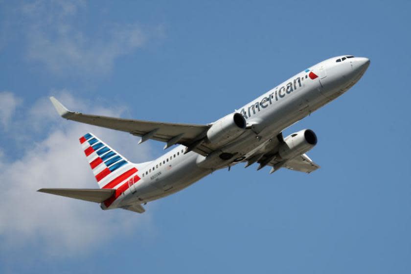 American Airlines says 13,000 workers can tear off notices after approval of the COVID-19 relief bill