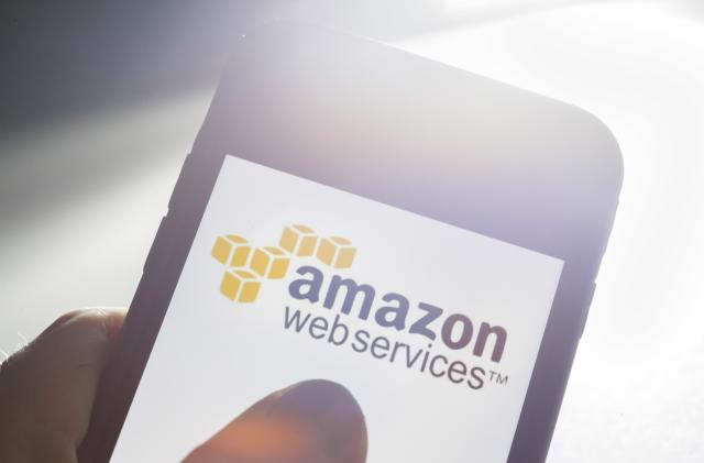 Berlin, Germany - July 09: In this photo illustration the Logo of Amazon Web Services ( AWS ) is displayed on a smartphone on July 09, 2019 in Berlin, Germany. (Photo by Thomas Trutschel/Photothek via Getty Images)