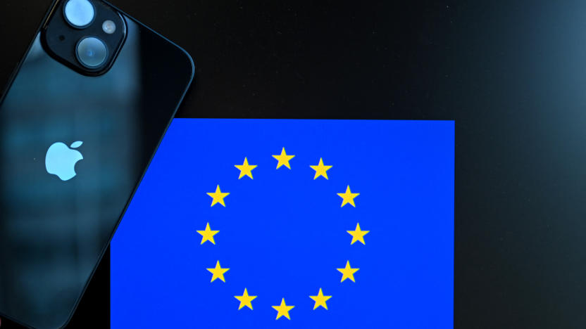 This photograph shows a smartphone with the Apple company logo (L) and the European Union logo (R), in Brussels on September 9, 2024. The European Court of Justice is set to give a ruling on Irish tax breaks to US company Apple on September 10, 2024. (Photo by Nicolas TUCAT / AFP) (Photo by NICOLAS TUCAT/AFP via Getty Images)