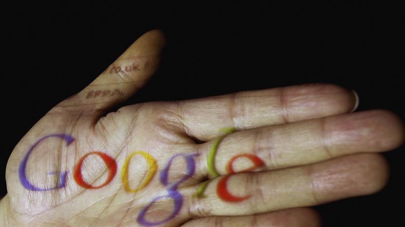 GLASGOW, UNITED KINGDOM - APRIL 12: In this photo illustration, the logo of the multi-facetted internet giant Google is seen projected onto the palm of a hand on April 12, 2006, in Glasgow, Scotland.  (Photo illustration by Jeff J Mitchell/Getty Images)