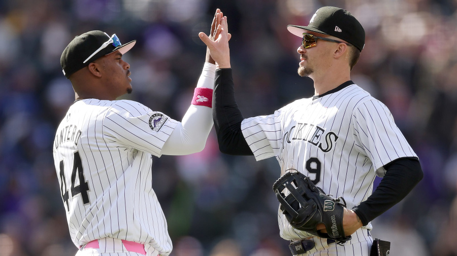 Getty Images - DENVER, COLORADO - MAY 12: Elehuris Montero #44 and Brenton Doyle #9 of the Colorado Rockies celebrate their win against the Texas Rangers at Coors Field on May 12, 2024 in Denver, Colorado. (Photo by Matthew Stockman/Getty Images)