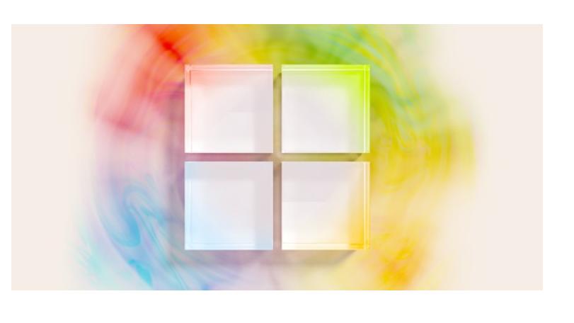 Microsoft September 2023 event logo, featuring splotches of red, greed, yellow and blue around four white squares.