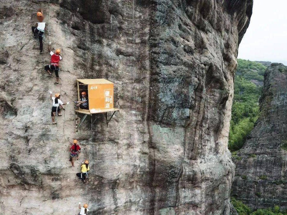 The world's 'most inconvenient' convenience store hangs on the side of a cliff i..