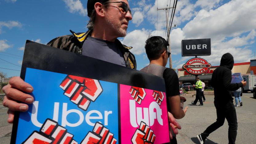 Uber and Lyft drivers protest during a day-long strike outside Uber’s office in Saugus, Massachusetts, U.S., May 8, 2019.   REUTERS/Brian Snyder