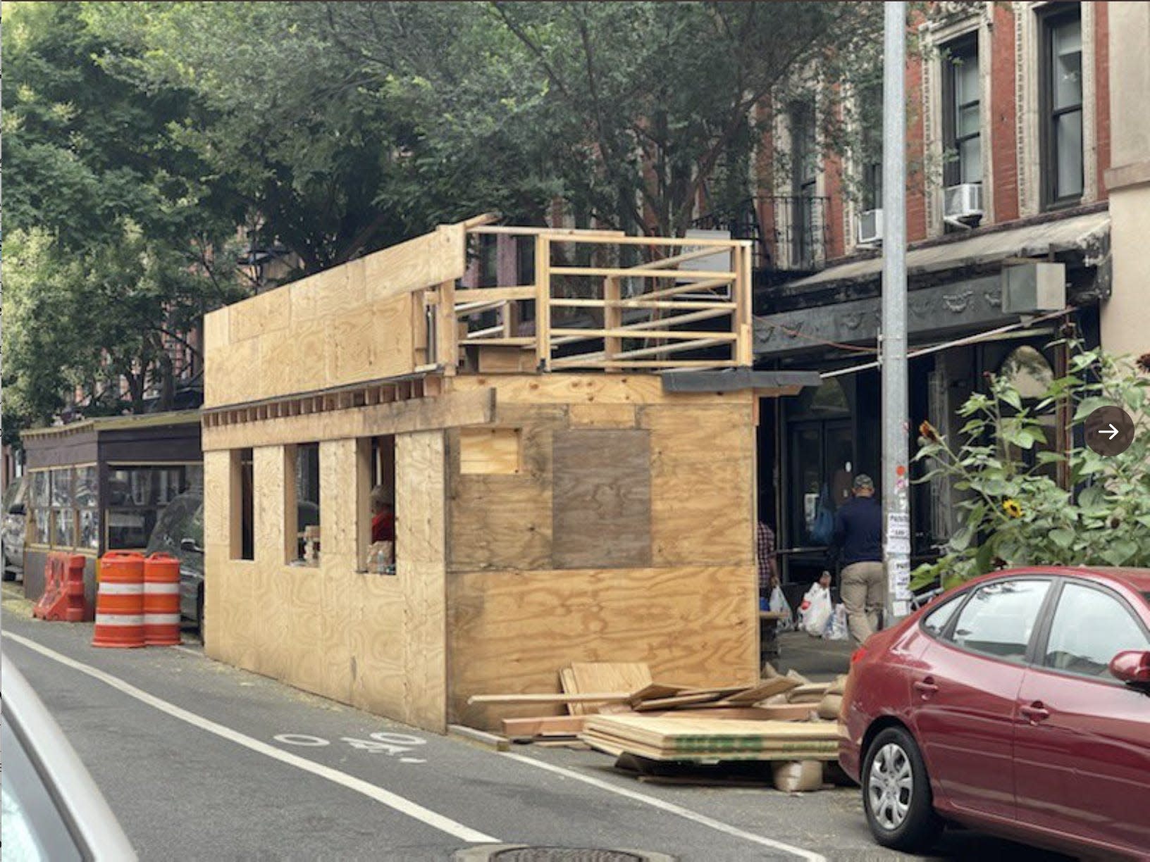 New York City restaurant ordered to stop building 2-story outdoor dining structure after locals complained