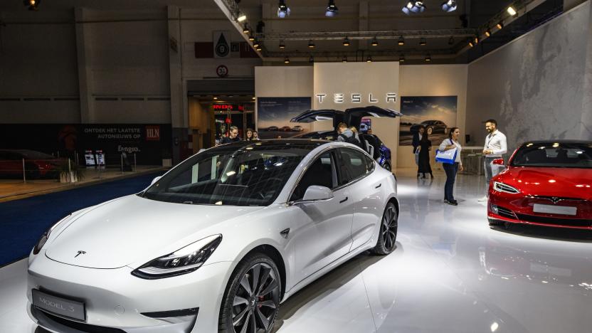 BRUSSELS, BELGIUM - JANUARY 09: Tesla Model 3 compact sedan car in white on display at Brussels Expo on January 9, 2020 in Brussels, Belgium. The Model 3 is fitted with a full self-driving system. (Photo by Sjoerd van der Wal/Getty Images)