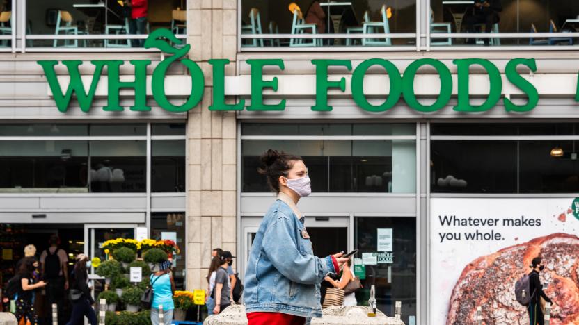 NEW YORK, NEW YORK - SEPTEMBER 29: A person wears a face mask outside Whole Foods Market in Union Square as the city continues Phase 4 of re-opening following restrictions imposed to slow the spread of coronavirus on September 29, 2020 in New York City. The fourth phase allows outdoor arts and entertainment, sporting events without fans and media production. (Photo by Noam Galai/Getty Images)