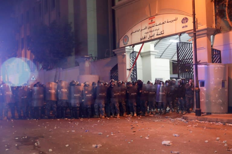 Lebanese riot police gather outside their barracks following a gathering to demand the release of detainees who were arrested overnight in Beirut on January 15 (AFP Photo/ANWAR AMRO)