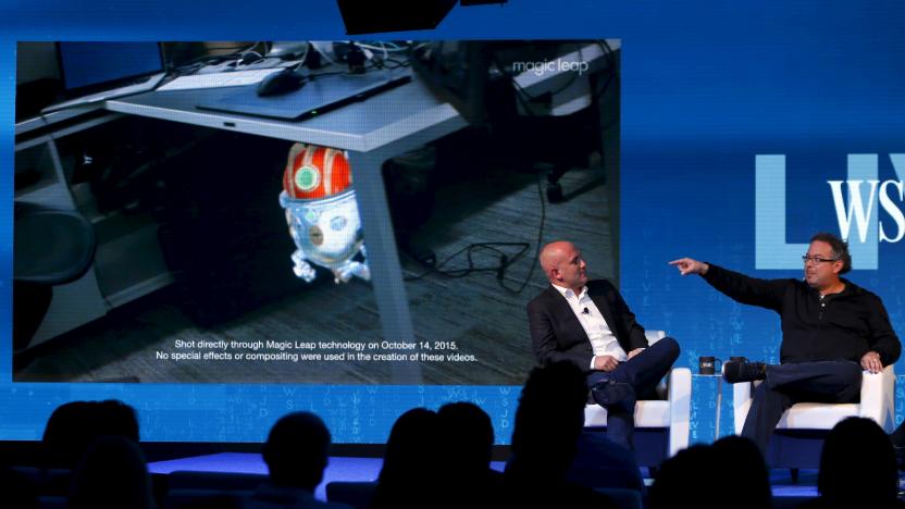 Rony Abovitz, founder president and CEO of Magic Leap (R) unveils a view of his companies augmented reality with Rio Caraeff, chief content officer, at the Wall Street Journal Digital Live ( WSJDLive ) conference at the Montage hotel in Laguna Beach, California  October 20, 2015.      REUTERS/Mike Blake