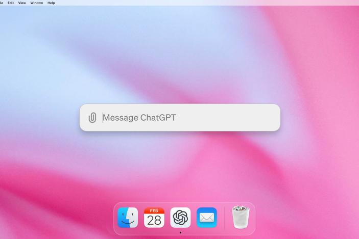 A macOS desktop with a search bar (center) that says "Message ChatGPT."