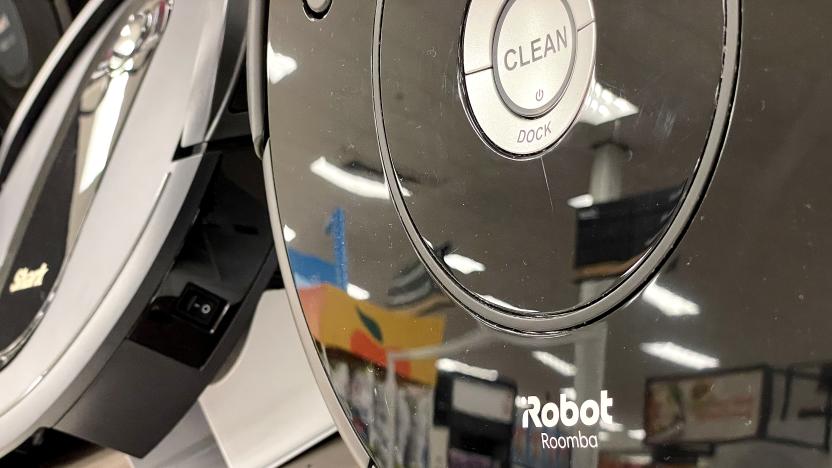 SAN RAFAEL, CALIFORNIA - AUGUST 05: A Roomba robot vacuum made by iRobot is displayed on a shelf at a Target store on August 05, 2022 in San Rafael, California. Amazon announced plans to purchase iRobot, maker of the popular robotic vacuum Roomba, for an estimated $1.7 billion. (Photo by Justin Sullivan/Getty Images)