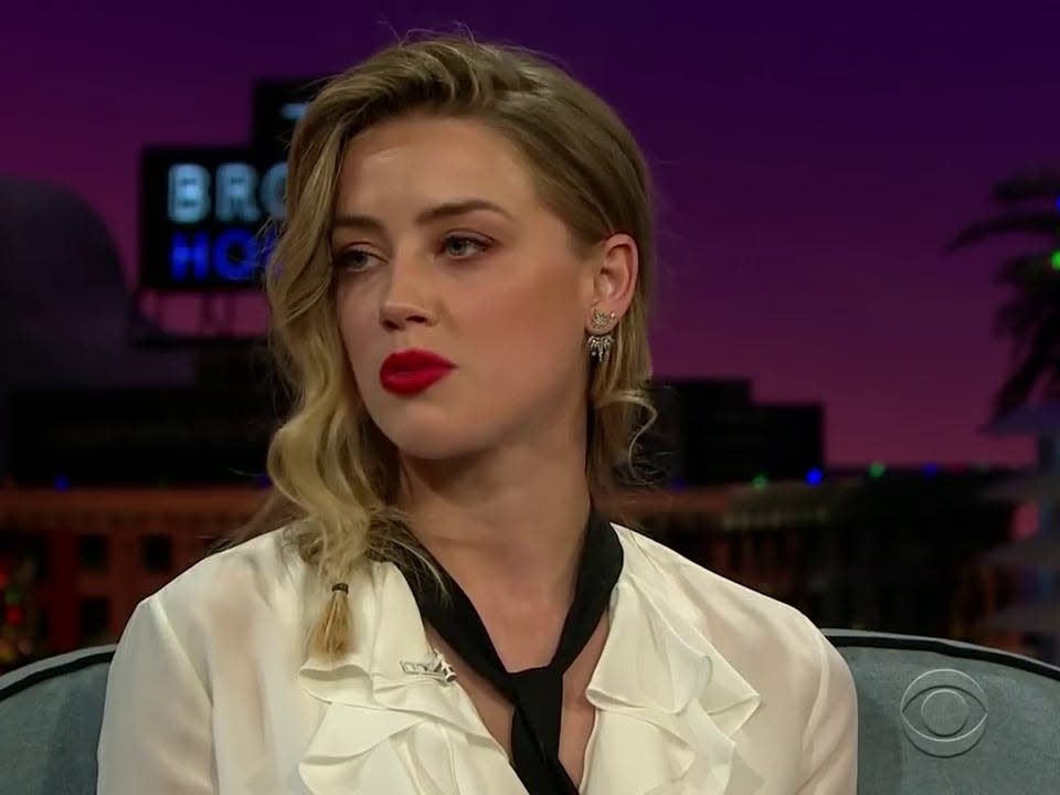 Makeup artist describes covering up Amber Heard's bruised face and busted lip af..