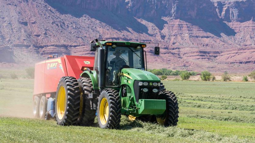 Baling hay with a John Deere 7930 tractor and a GPT Twin Pak baler on a ranch in southern Utah. (Photo by: Jon G. Fuller/VW Pics/Universal Images Group via Getty Images)