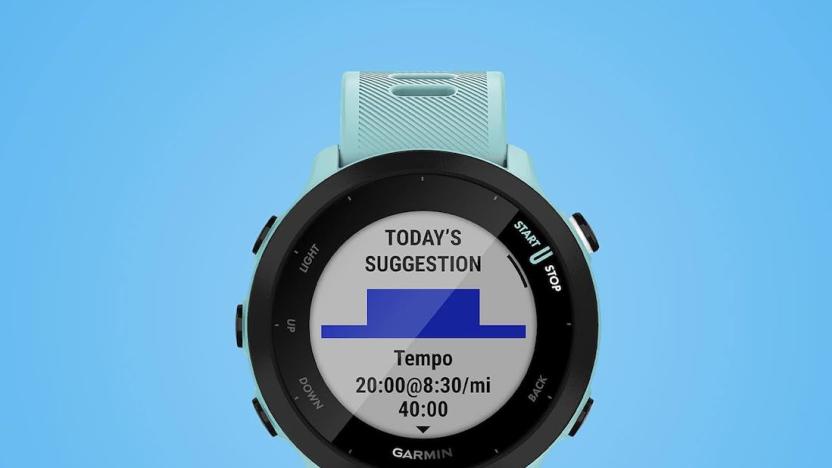 An aqua colored watch faces forward with a workout suggestion on its face. 