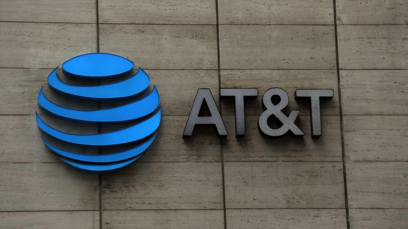 DALLAS, TEXAS - MARCH 13:  The logo of AT&T outside of AT&T corporate headquarters on March 13, 2020 in Dallas, Texas.  AT&T is allowing employees to work remotely from home if they have the ability to do so, as a safety measure due to COVID-19. (Photo by Ronald Martinez/Getty Images)