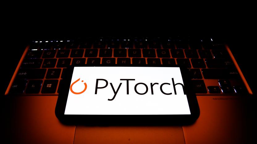 PyTorch logo displayed on a phone screen and a laptop keyboard are seen in this illustration photo taken in Krakow, Poland on December 1, 2021. (Photo by Jakub Porzycki/NurPhoto via Getty Images)