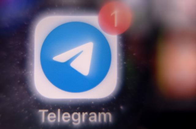 This photo taken on March 23, 2022 shows the mobile messaging and call service Telegram logo on a smartphone screen in Moscow. (Photo by AFP) (Photo by -/AFP via Getty Images)