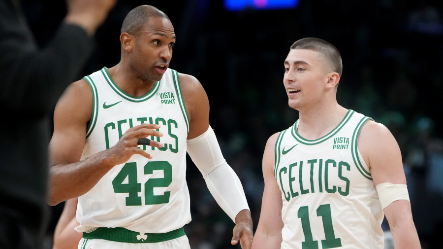 Getty Images - Boston, MA - May 21: Boston Celtics center Al Horford talks to guard Payton Pritchard in the first quarter of Game 1 of the 2024 Eastern Conference Finals. (Photo by Barry Chin/The Boston Globe via Getty Images)