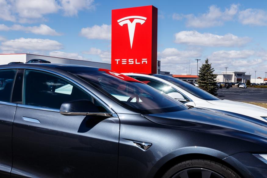 Indianapolis - Circa March 2019: Tesla Service Center. Tesla says new V3 Supercharger stations will reduce recharging times by half II