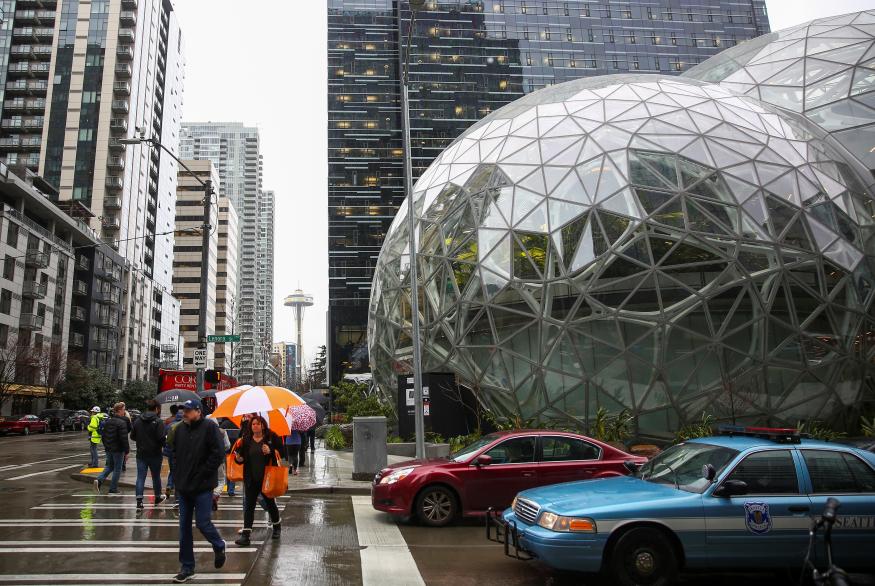 The Amazon Spheres are seen from Lenora Street, the Space Needle in the background, at AmazonÕs Seattle headquarters in Seattle, Washington, U.S., January 29, 2018.    REUTERS/Lindsey Wasson
