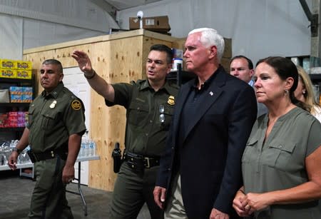 Image result for Pence views overcrowded, bad-smelling facility for detained migrants in Texas