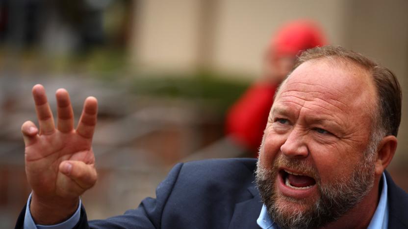 Infowars founder Alex Jones speaks to the media after appearing at his Sandy Hook defamation trial at Connecticut Superior Court in Waterbury, Connecticut, U.S., October 4, 2022. REUTERS/Mike Segar