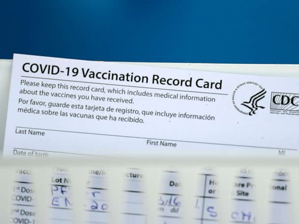 Hold the COVID-19 vaccination card – it is important